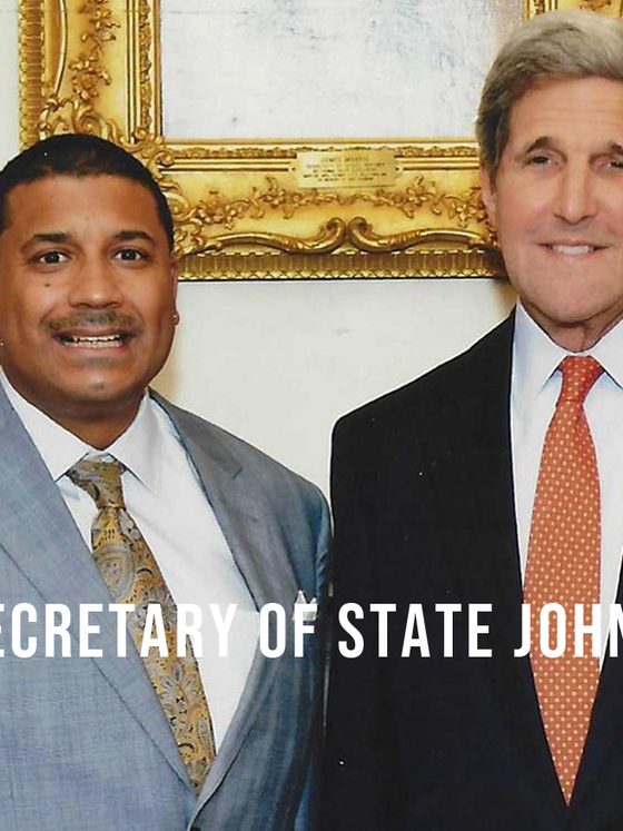 Frank Rose with former Secretary of State John Kerry